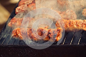 BBQ. Closeup of barbecue grilling picnic in backyard outdoor