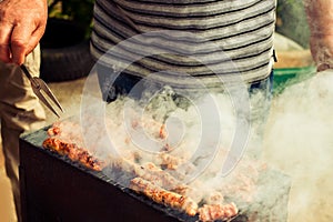 BBQ. Closeup of barbecue grilling picnic in backyard outdoor