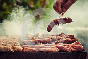 BBQ. Closeup of barbecue grilling picnic in backyard outdoor