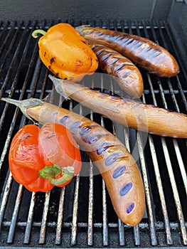 BBQ eggplants and peppers on grill
