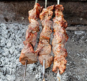 BBQ fresh beef meat chop slices. Traditional eastern dish, shish kebab