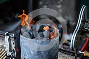 BBQ Grill Pit Glowing And Flames Hot Charcoal Briquettes coal Food Background Or Texture Close-Up Top View