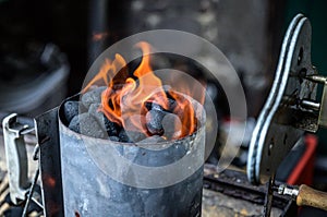 BBQ Grill Pit Glowing And Flames Hot Charcoal Briquettes coal Food Background Or Texture Close-Up Top View