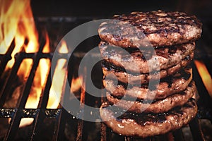 BBQ Grilled Burgers Patties On The Hot Flaming Grill