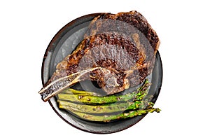 BBQ Grilled Tomahawk or Cowboy with bone beef steak, roasted asparagus. Isolated on white background.
