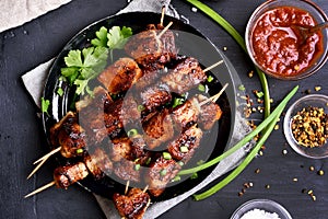 Bbq meat on wooden skewers photo