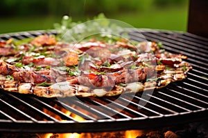 bbq pizza with thinly sliced meat on a hot grill