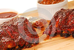 BBQ Ribs with beans and dipping sauce