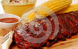 BBQ Ribs with cole slaw, corn and dipping sauce