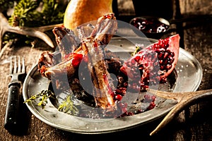 BBQ Venison Spare Ribs with Pomegranate Wedge