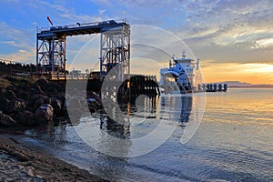 BC Ferries Salish Heron arriving at Dock on Mayne Island at Sunset, Village Bay, Gulf Island, British Columbia