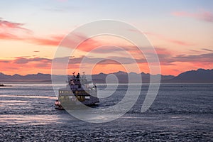 BC Ferry near active pass in the Gulf Islands at sunset.