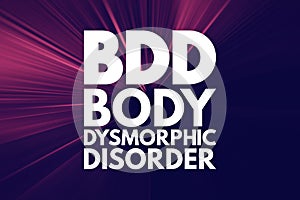 BDD - Body Dysmorphic Disorder acronym, medical concept background photo