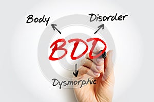BDD - Body Dysmorphic Disorder is a mental health disorder, acronym text concept background