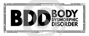 BDD - Body Dysmorphic Disorder is a mental health disorder, acronym text concept stamp photo