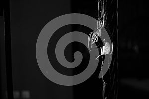 BDSM Leather handcuffs for role-playing games on a black background. Bondage for carnal pleasures. Domination and
