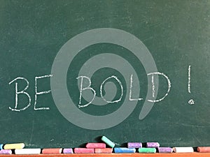 Be Bold! written on a chalkboard