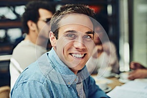 Be the change you want to see in the company. Cropped shot of designers having a meeting at a coffee shop.