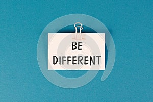 Be different is standing on the paper, make a difference, coaching and motivation concepts