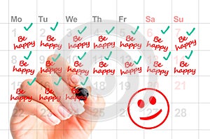 Be happy every day of your life concept with woman handwriting reminders