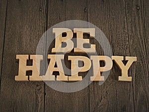 Be Happy, text words typography written with wooden letter, life and business motivational inspirational
