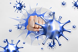Be healthy - boost your immunity to fight with illness. Woman showing clenched fist surrounded by viruses, closeup photo