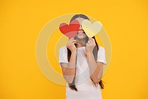 be my valentine. teen girl on yellow background. love present. positive kid with love romantic gift