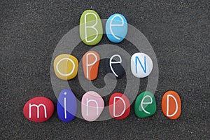 Be open minded phrase composed with colored stones