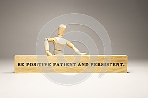 Be positive patient and persistent wooden surface was written. Motivation and personal development
