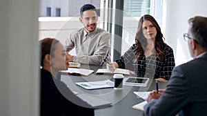 Be teachable, youre not always right. a group of businesspeople having a meeting in a modern office.