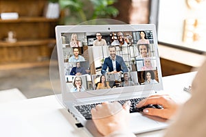 Back view on laptop screen, a businesswoman using laptop for video call photo