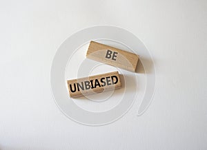 Be Unbiased symbol. Wooden blocks with words Be Unbiased. Beautiful white background. Business and Be Unbiased concept. Copy space