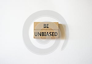 Be Unbiased symbol. Wooden blocks with words Be Unbiased. Beautiful white background. Business and Be Unbiased concept. Copy space