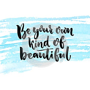 Be your own kind of beautiful. Inspirational quote about beauty and self esteem. Brush lettering at blue watercolor photo