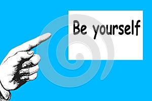 `Be Yourself`. The direction of the finger points to a motivational and inspirational message.