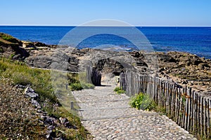 Beach access by stone stairs at Les-Sables-d`Olonne in vendee france