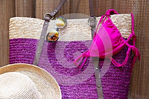 beach accessories on a brown tiki style background
