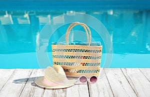 Beach accessories on  deck near outdoor swimming pool