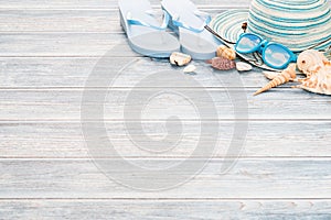 Beach accessories on wooden board.