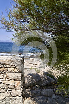 Beach in the area of Supetar. Brac island . Croatia .