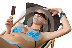 Beach - Attractive woman with hat and ice lolly