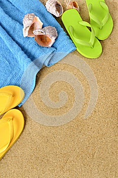 Summer beach background flip flops sand copy space vertical
