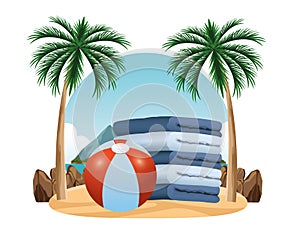 Beach ball and towels piled up