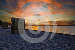 Beach at the baltic sea on the island Poel in germany with sunset in the evening