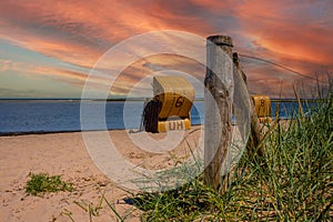 Beach at the baltic sea on the island Poel in germany with sunset in the evening