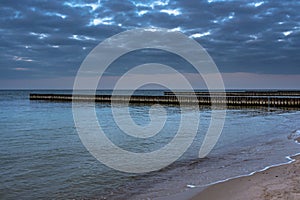 Beach of Baltic sea in Svetlogorsk at sunset. Kaliningrad region. Russia