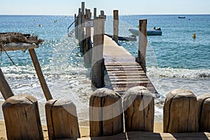 Beach bar on legendary Pampelonne beach near Saint-Tropez with white sand and crystal clear blue water, summer vacation on French