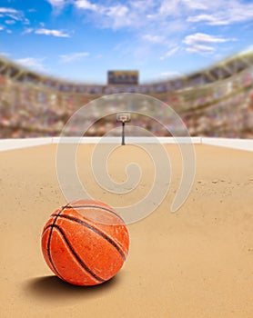 Beach Basketball Arena With Ball on Sand and Copy Space