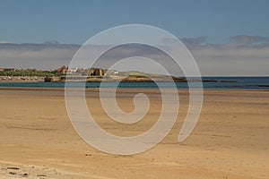 The beach at Beadnell Bay look towards the lime kilns & Harbour