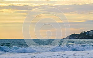 Beach with beautiful huge big surfer waves Puerto Escondido Mexico
